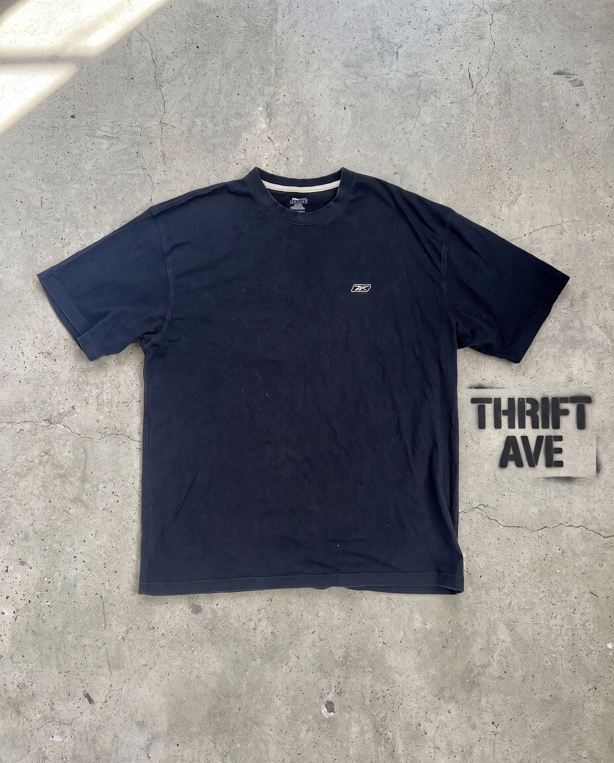 Reebok Rbk Tee — ricostruzione: su cemento